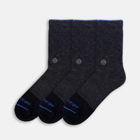Three-pack of WALK IT OFF The 24/7 merino socks in Antracite, arranged on a light grey background.