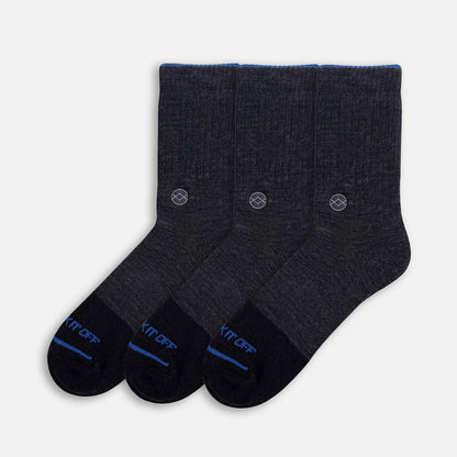 Three-pack of WALK IT OFF The 24/7 merino socks in Antracite, arranged on a light grey background.