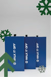 Blauwe WALK IT OFF cadeauboxen met feestdagendecoratie voor december.