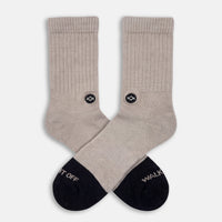 WALK IT OFF Merino sokken Biscuit – productfoto vooraanzicht met logo zichtbaar.
